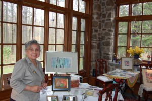 Anna Ozolins displays her watercolors during the "Arts at the Inns"
