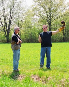 Chris Davis instructs Innkeeper Mark Ellis on the art of Falconry