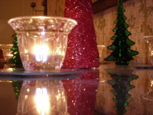 Candlelight adds a festive glow to holiday decorations at Clamber Hill